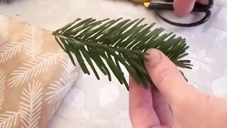 Christmas tree logo made of pine leaves