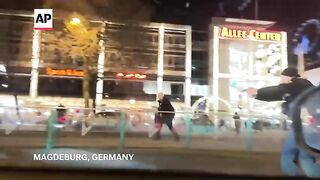 Video shows Germany police detaining suspect at gun point after suspected attack.