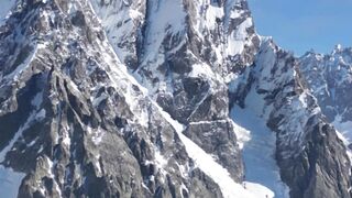 GEORGIA, Mount Ushba is a twin-peaked mountain in the Caucasus Mountains, located on the border between Russia and Georgia