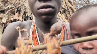 Hadzabe tribe man enjoying his breakfast