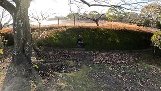 Tuxedo the cat licks his fingers after a man gives him a penis massage