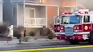 Firefighter_narrowly_escapes_blaze_on_Jersey_Shore_deck(240p).mp4