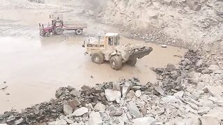 Powerful BOBCAT Loader Loading Stones into Trailer | Amazing Stone Crushing Work!