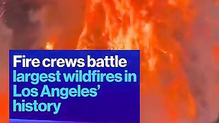 Fire_crews_battle_largest_wildfires_in_Los_Angeles__history(480p).mp4