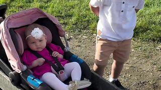 A child, his sister and his two pets