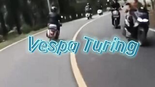 touring by riding a vespa motorbike