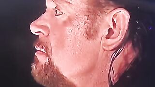 The undertaker rolls eyes back at the audience…