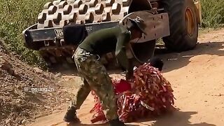 A soldier beating up a masquerade