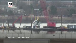 DC plane crash- Engine and large portion of jet recovered from river.