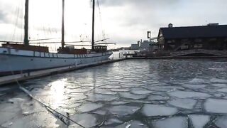 Polar Vortex walk in frigid Toronto Frozen Lake Ontario Canada