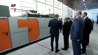 Putin visits a UAV enterprise in Saint Petersburg, Russia.