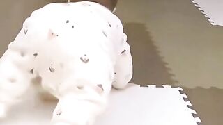 Baby crawling on his face