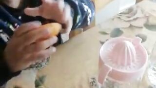 Cute Baby Squeezing Oranges For Family